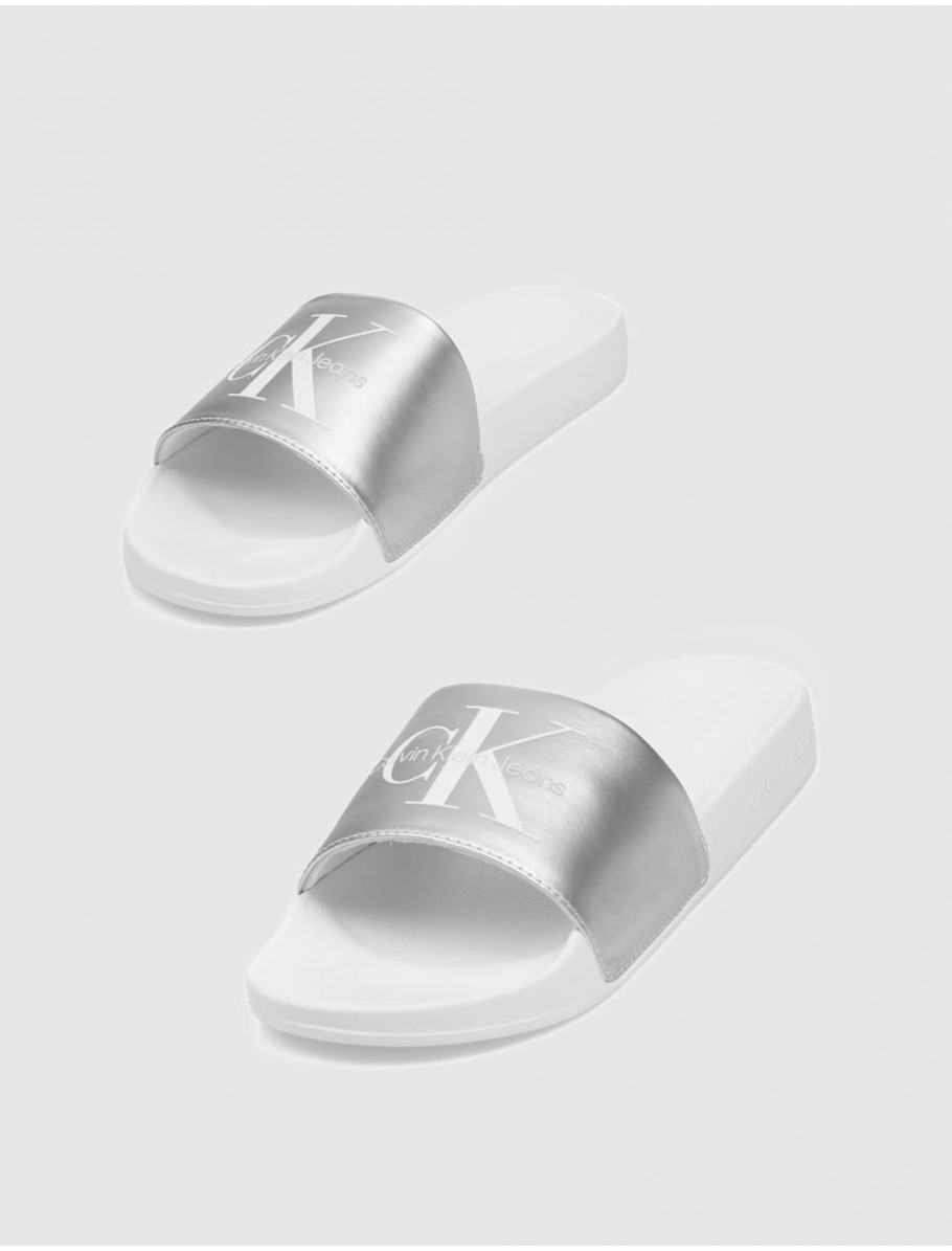 CHANCLA CALVIN KLEIN SLIDE NY PEARL BLANCO