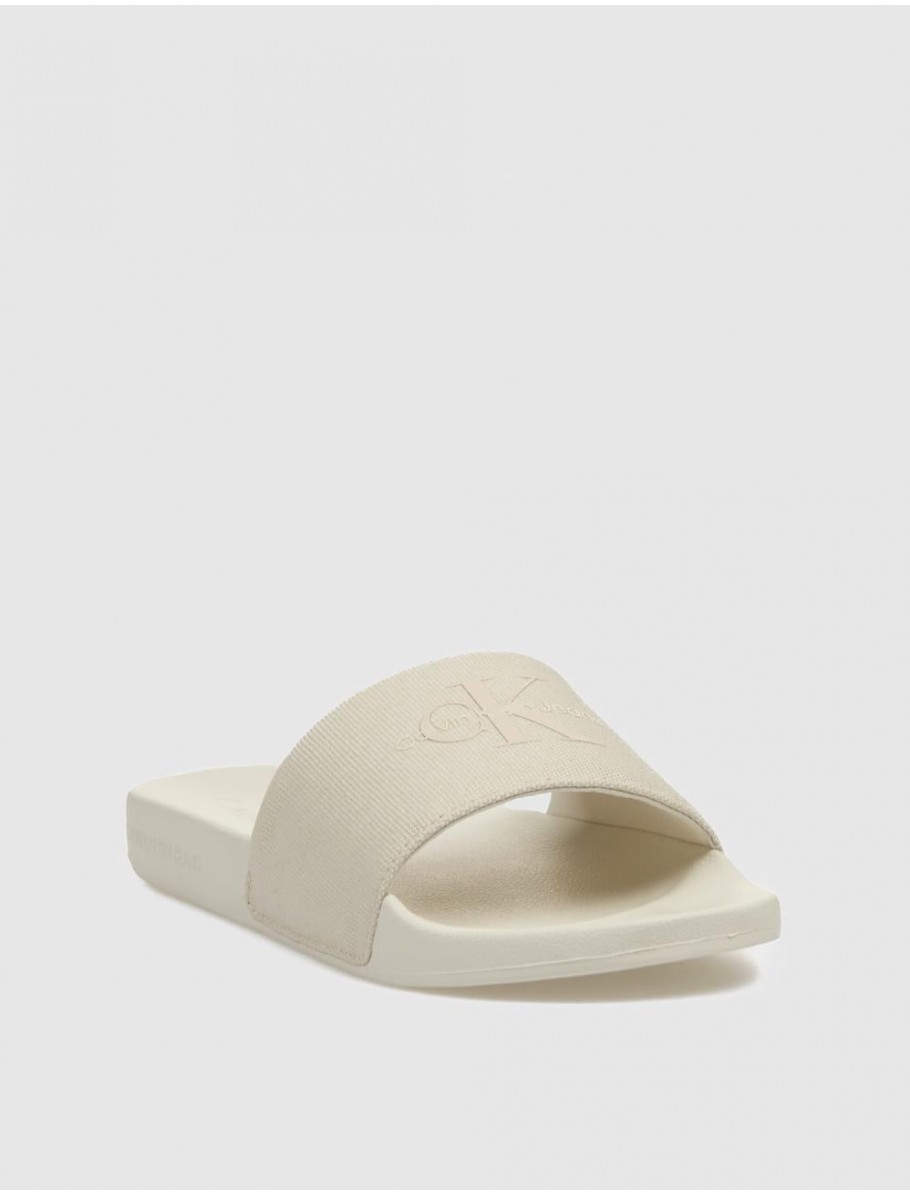 CHANCLA CALVIN KLEIN SLIDE MONOGRAM WN BEIG