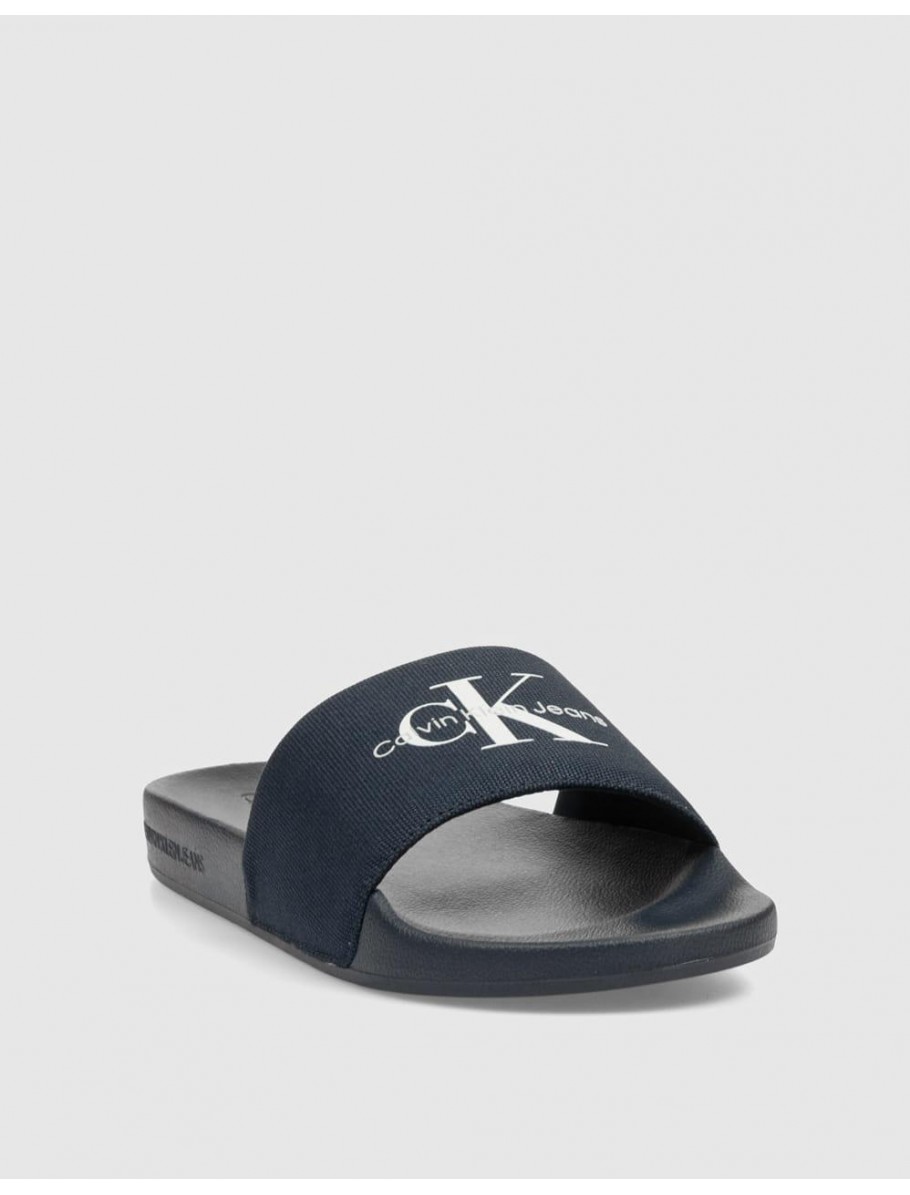 CHANCLA CALVIN KLEIN SLIDE MONORAM CV MARINO