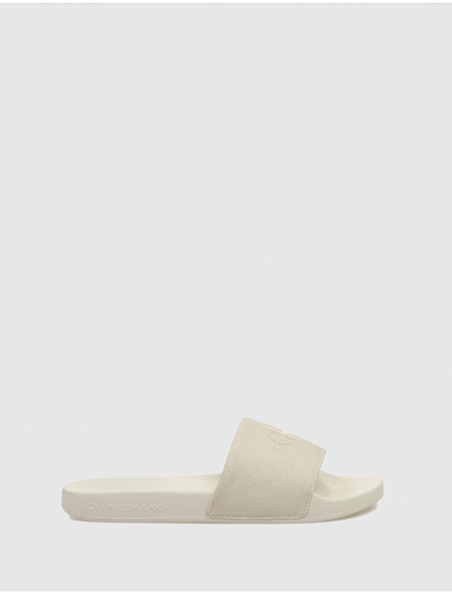 CHANCLA CALVIN KLEIN SLIDE MONOGRAM WN BEIG