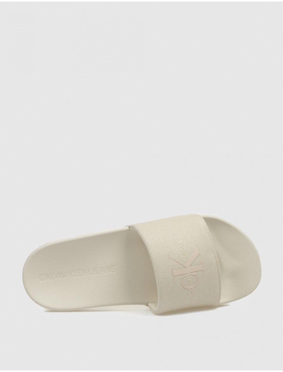CHANCLA CALVIN KLEIN SLIDE MONOGRAM WN BEIG