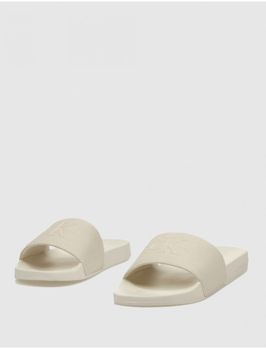 CHANCLA CALVIN KLEIN SLIDE MONOGRAM WN BEIG