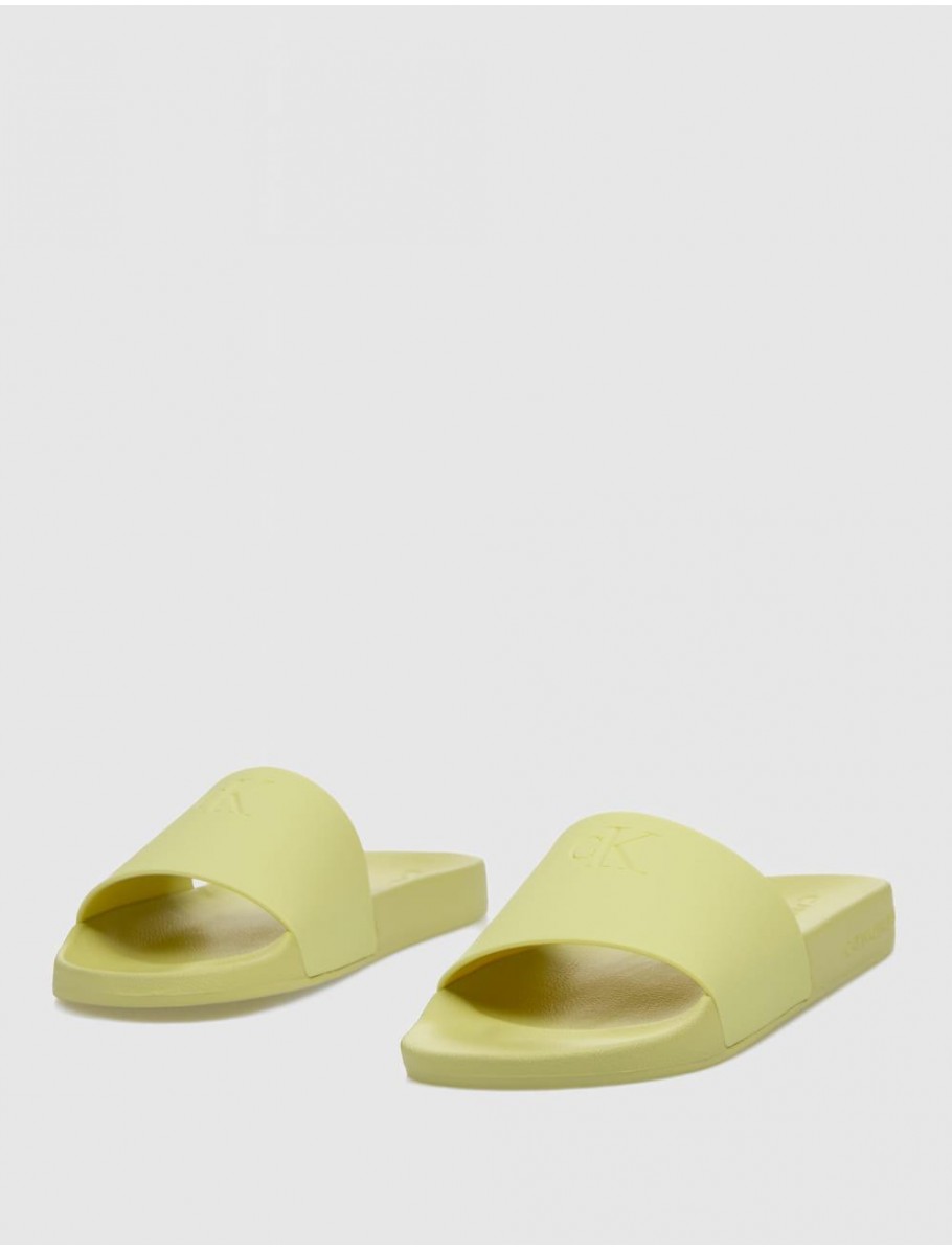 CHANCLA CALVIN KLEIN SLIDE MONOGRAM TPU AMARILLO