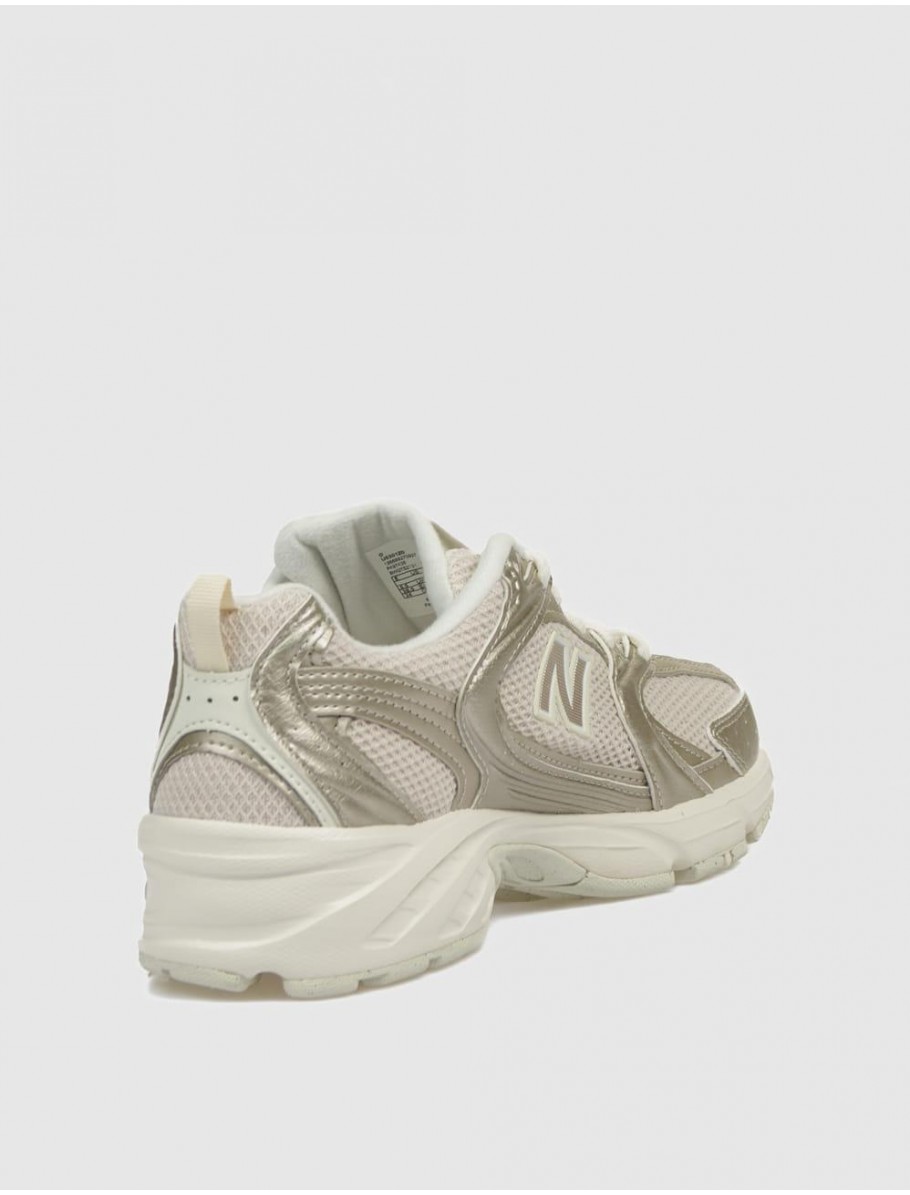 ZAPATILLA NEW BALANCE U530 ORO