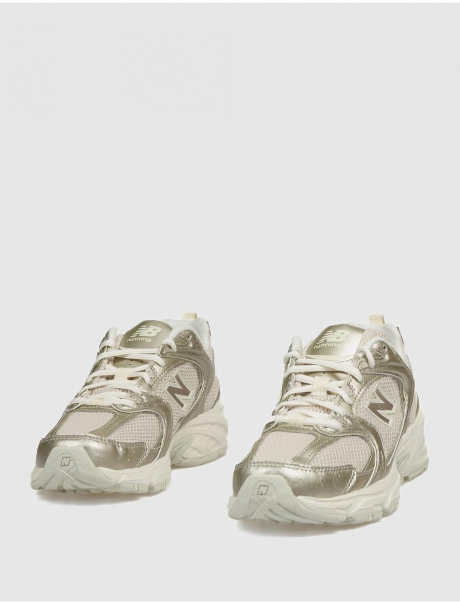 ZAPATILLA NEW BALANCE U530 ORO