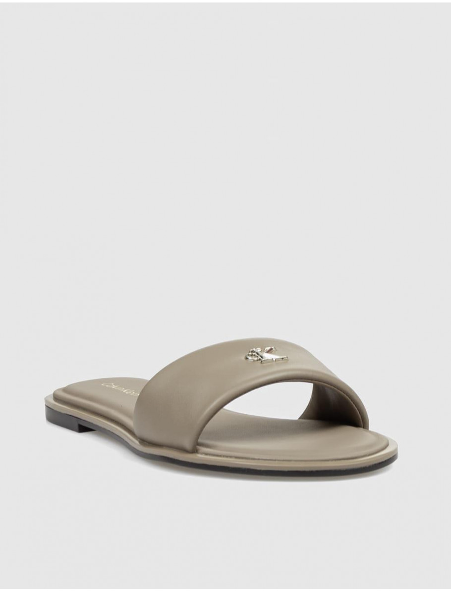 SANDALIA CALVIN KLEIN ROUND FLAT SNDL LTH BAR HW 2 TAUPE