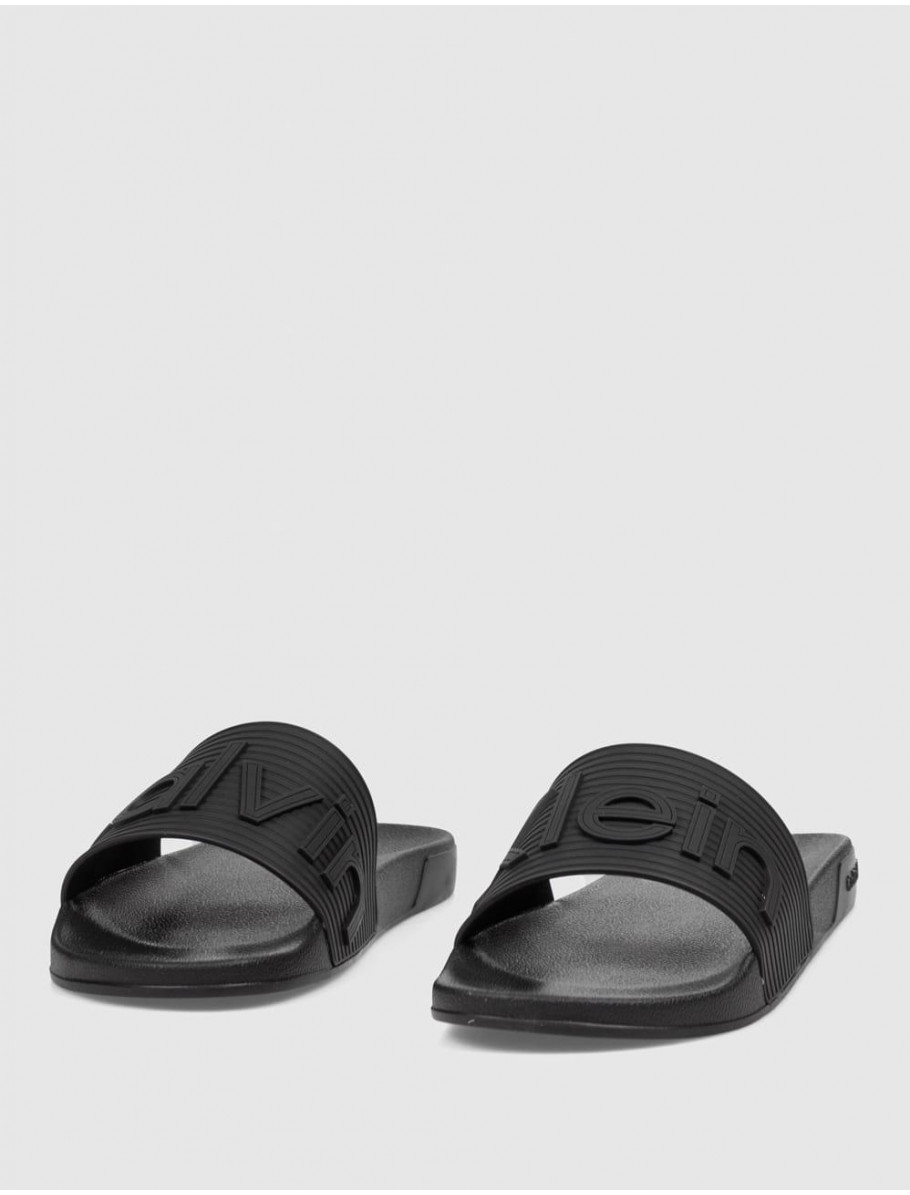 CHANCLA CALVIN KLEIN ESS SLIDE TEXTURE NEGRO