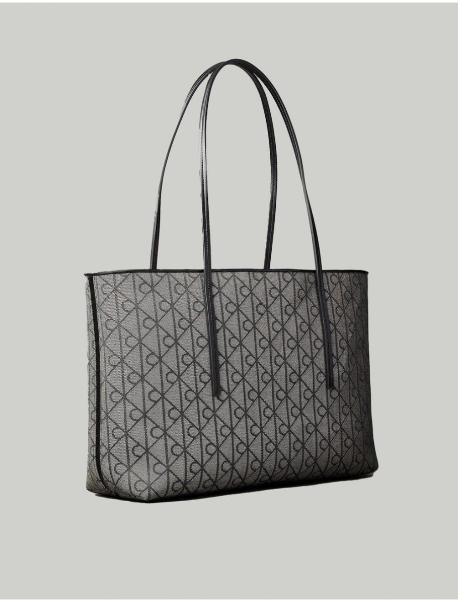 BOLSO CALVIN KLEIN EMBLEM AOP JACQUARD TOTEW POUCH BEIG