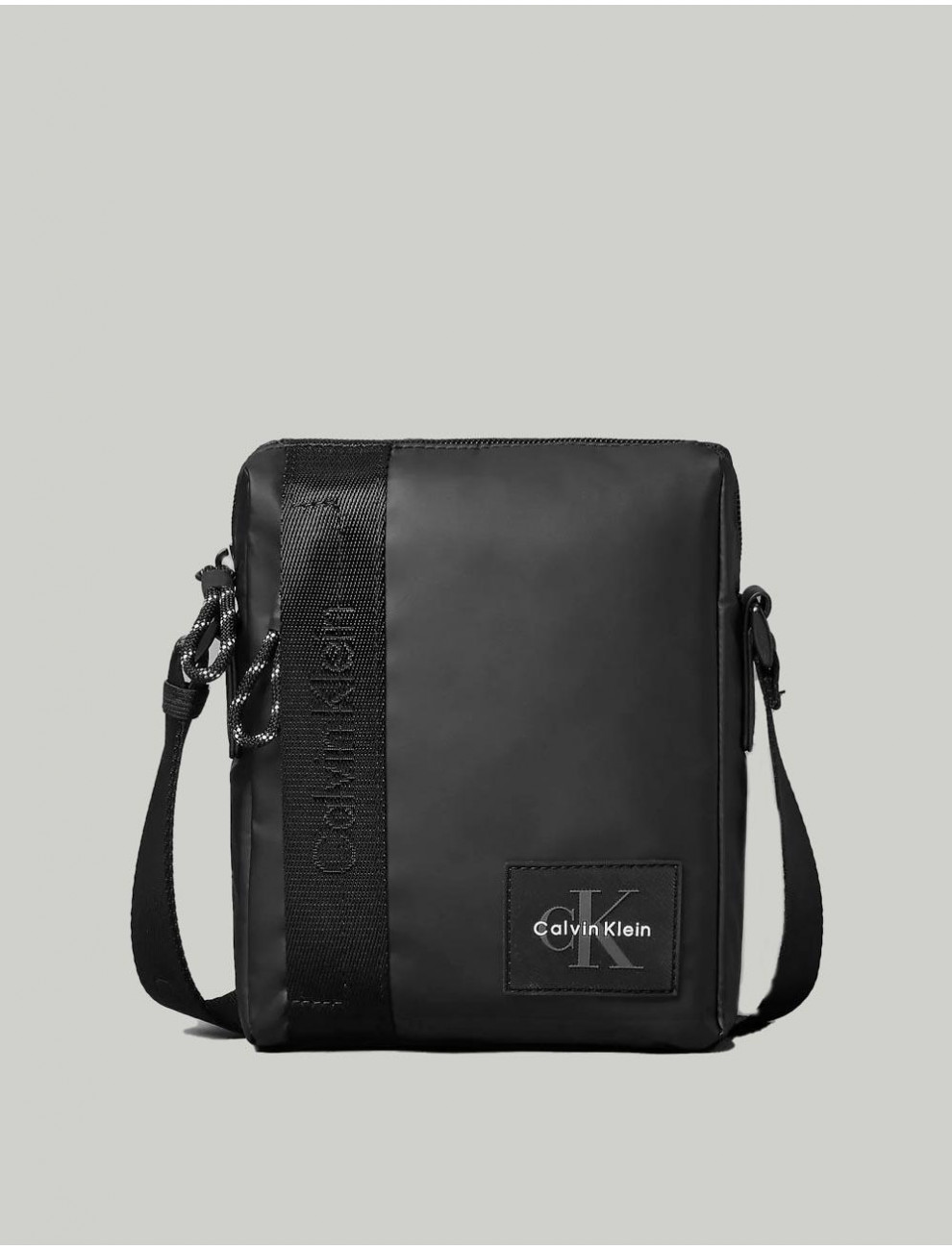 BANDOLERA CALVIN KLEIN RUBBERIZED REPORTER NEGRO